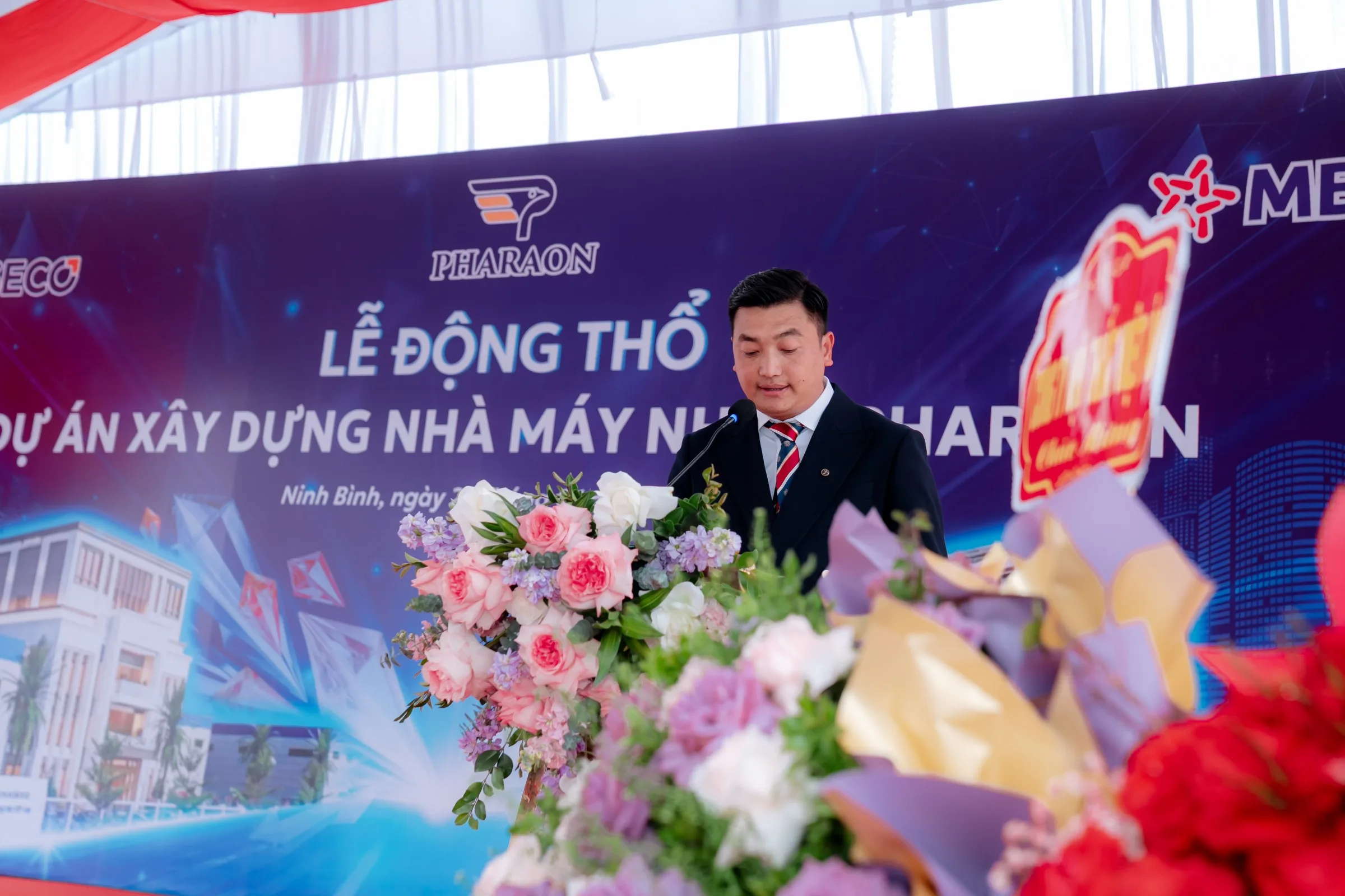 Pharaon representative speaking at the groundbreaking ceremony