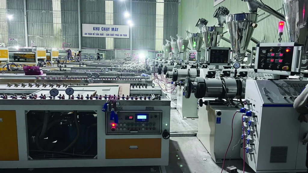 Row of extrusion line control panels at the Pharaon plant