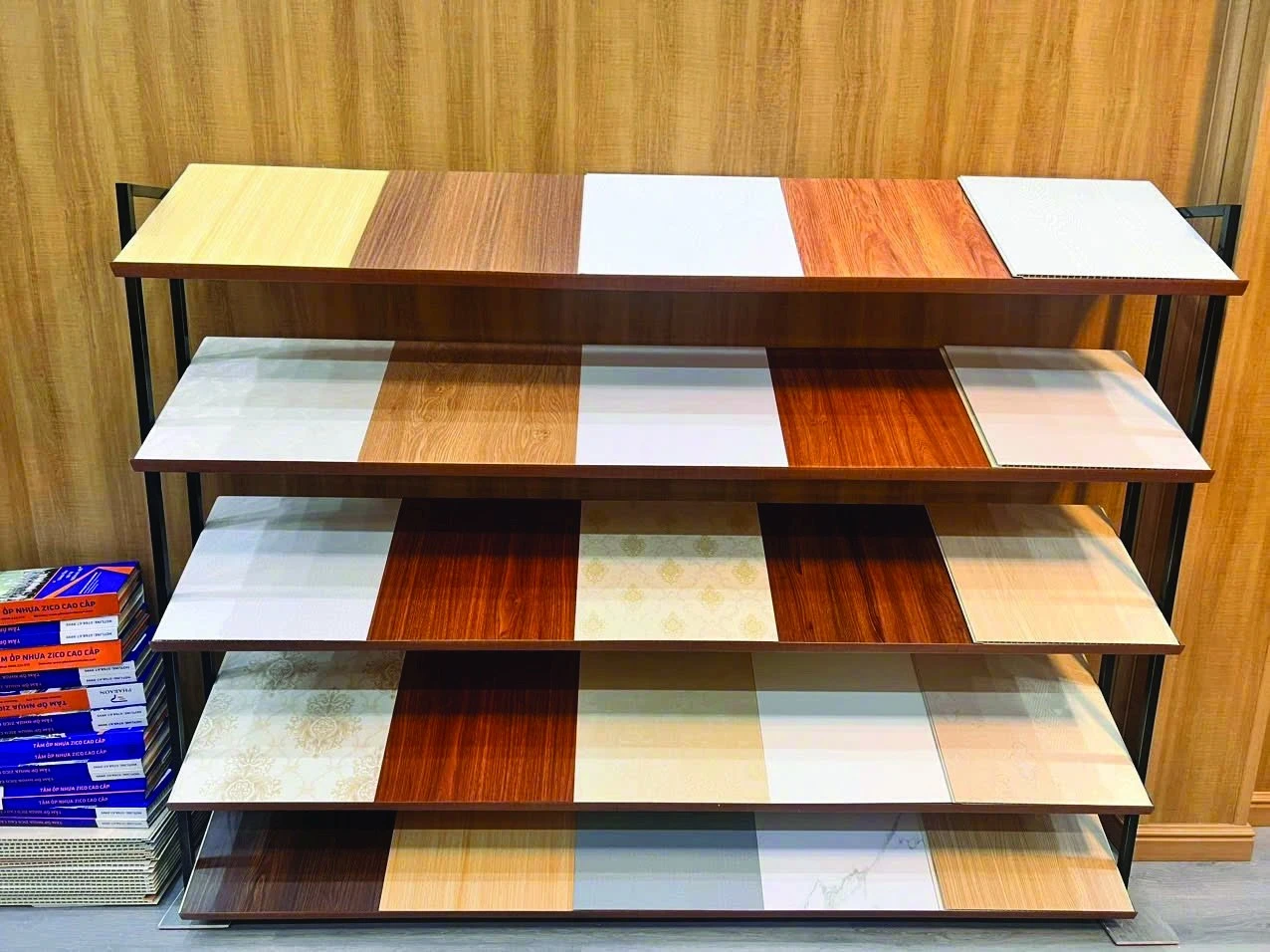 Display rack showing the range of Pharaon wall panel surface finishes