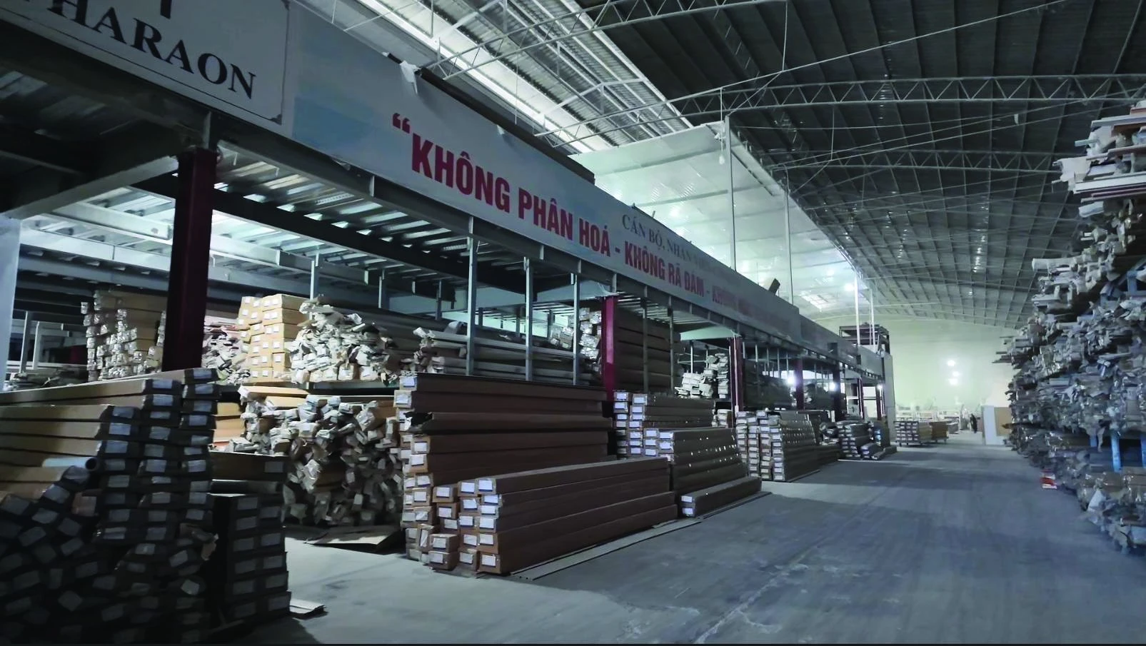 Finished Pharaon panels and profiles stacked in the plant warehouse
